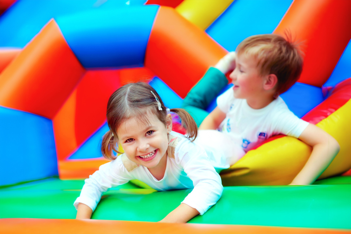 Young,Independent,Woman,Relaxing,On,Grass,In,Park