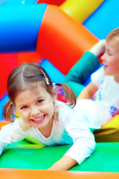 Young,Independent,Woman,Relaxing,On,Grass,In,Park