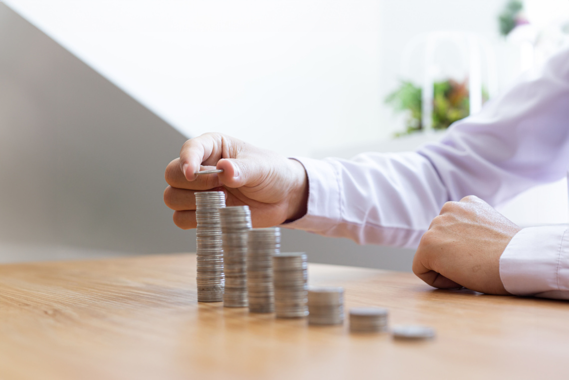 Young,Independent,Woman,Relaxing,On,Grass,In,Park