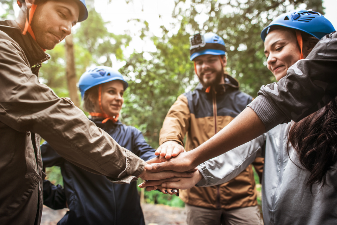 Young,Independent,Woman,Relaxing,On,Grass,In,Park