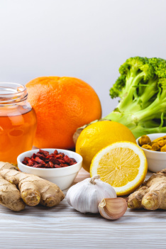 Young,Independent,Woman,Relaxing,On,Grass,In,Park