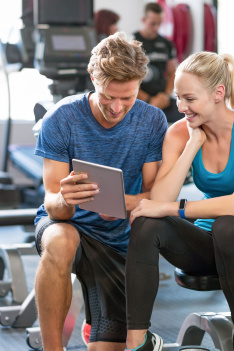 Young,Independent,Woman,Relaxing,On,Grass,In,Park